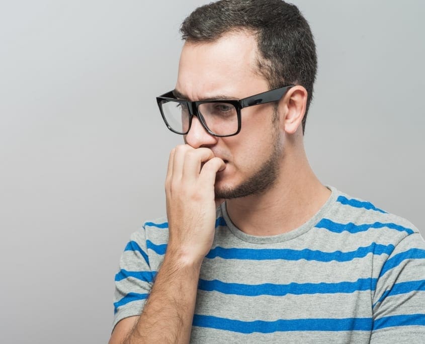 Mens Counselling - Man Bitting Finger Nails Stressing